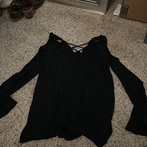 Black top with cut out shoulder and criss cross in front